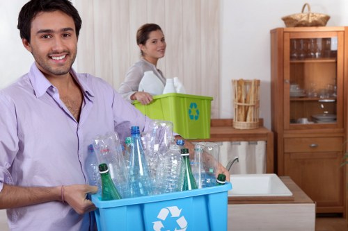 Workers sorting recyclables at a segregated collection point